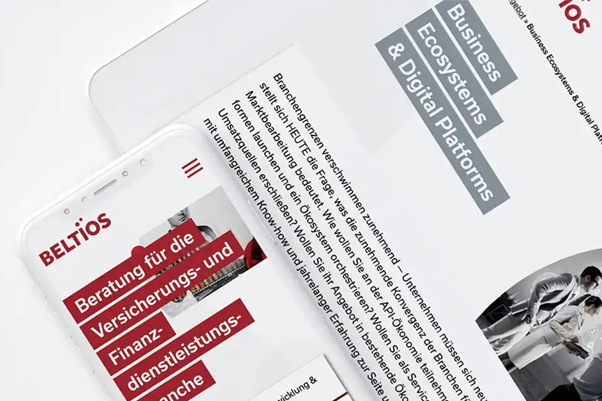 Digitale Marketingdarstellung der Marke 'BELTIOS', gestaltet von einer Designagentur für eine starke visuelle Präsenz. Auf einem Smartphone-Bildschirm ist die Website mit roter Schrift und dem Slogan 'Beratung für die Versicherungs- und Finanzdienstleistungsbranche' zu sehen. Daneben ein Screen mit der Überschrift 'Business Ecosystems & Digital Platforms' und Text zu Marktstrategien und digitalen Ökosystemen. Das Design mit moderner Typografie und roten sowie grauen Akzenten zeigt, wie eine Designagentur durch gezielte Gestaltung Unternehmen bei ihrer Markenkommunikation unterstützt.