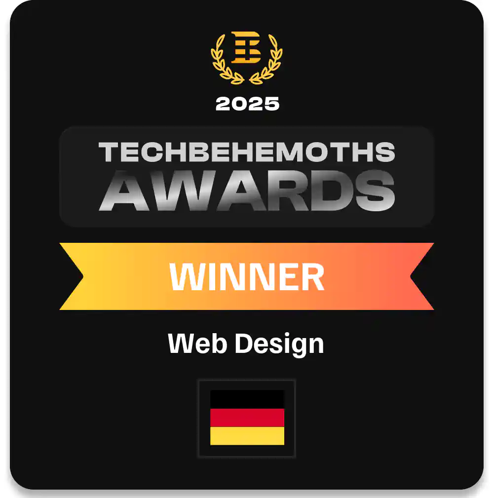Auszeichnungsgrafik der TechBehemoths Awards 2025 für den Gewinner in der Kategorie Web Design in Deutschland. Oben ist ein goldfarbenes Symbol mit Lorbeerkranz und dem Buchstaben „B“ zu sehen, darunter die Aufschrift „TechBehemoths Awards“, ein orange-gelbes Banner mit der Beschriftung „Winner“, gefolgt von „Web Design“ und einer Deutschlandflagge unten.