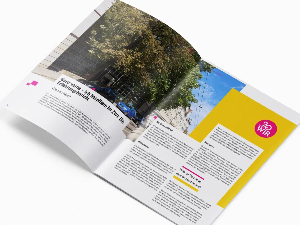 Open anniversary brochure from Jobcenter München featuring a large photo of a tree-lined street and several columns of text. A yellow panel on the right displays the “20 Jahre WIR” logo.