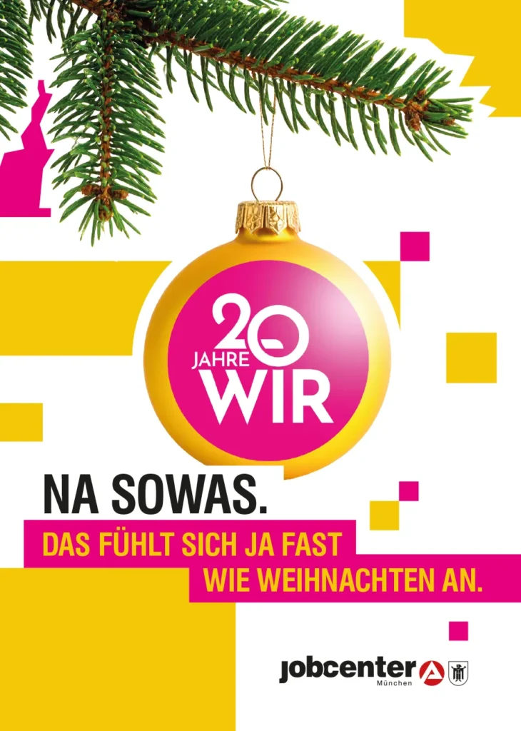Anniversary poster for Jobcenter München featuring a yellow Christmas bauble hanging from a fir branch. The bauble reads “20 Jahre WIR”, with the text below: “Na sowas. Das fühlt sich ja fast wie Weihnachten an.”.
